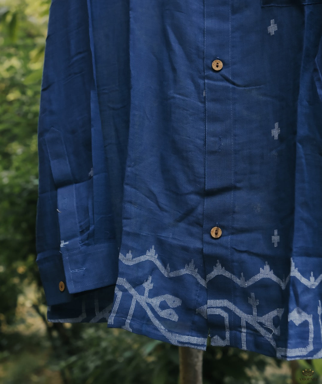 Men’s cotton shirt with Jamdani weaving, featuring traditional motifs and a relaxed silhouette.