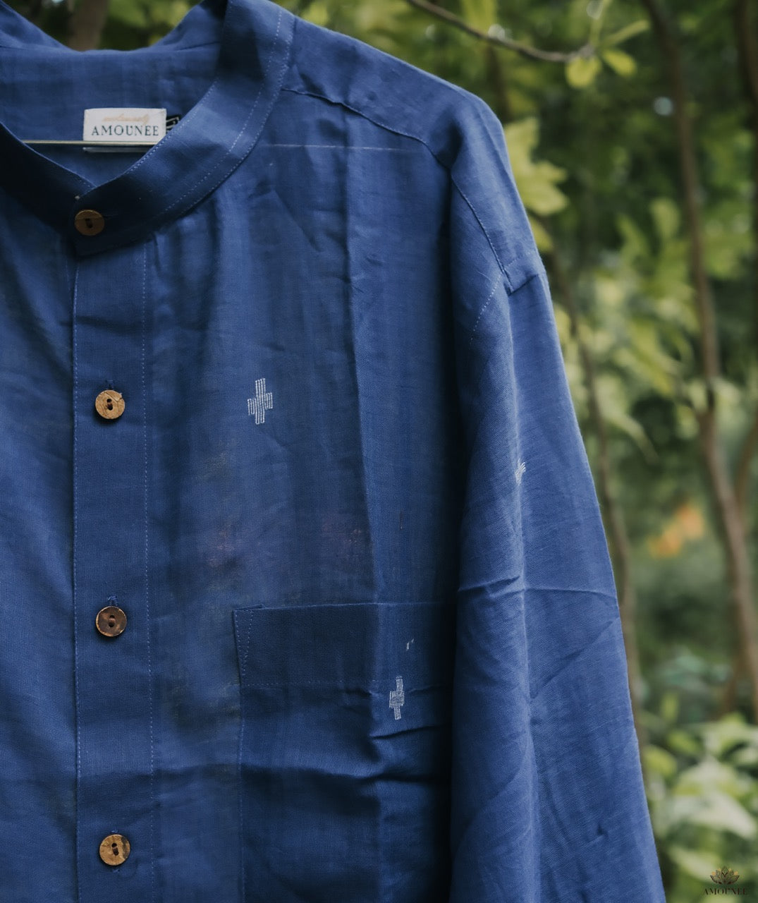 Men’s cotton shirt with Jamdani weaving, featuring traditional motifs and a relaxed silhouette.