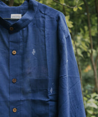Men’s cotton shirt with Jamdani weaving, featuring traditional motifs and a relaxed silhouette.