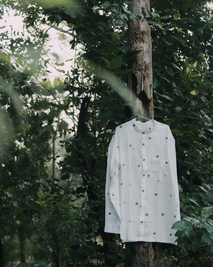 Men’s cotton shirt with Jamdani weaving, featuring traditional motifs and a relaxed silhouette.