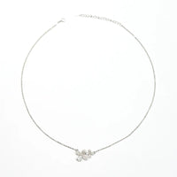 Bloom Duo Necklace — close-up of two bloom pendant necklace in sterling silver, ethical artisan jewelry