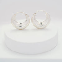 Chunky Bag Hoops — close-up of bold silver chunky hoop earrings with presence, ethical jewelry Mitti Lifestyle