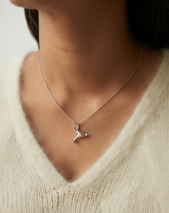 Martini Charm Necklace — whimsical recycled silver martini charm on fine chain, side view ethical jewelry