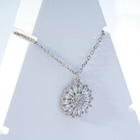 Bold Bloom Necklace — close-up of bold silver bloom pendant on fine chain, ethical artisan jewelry Mitti Lifestyle