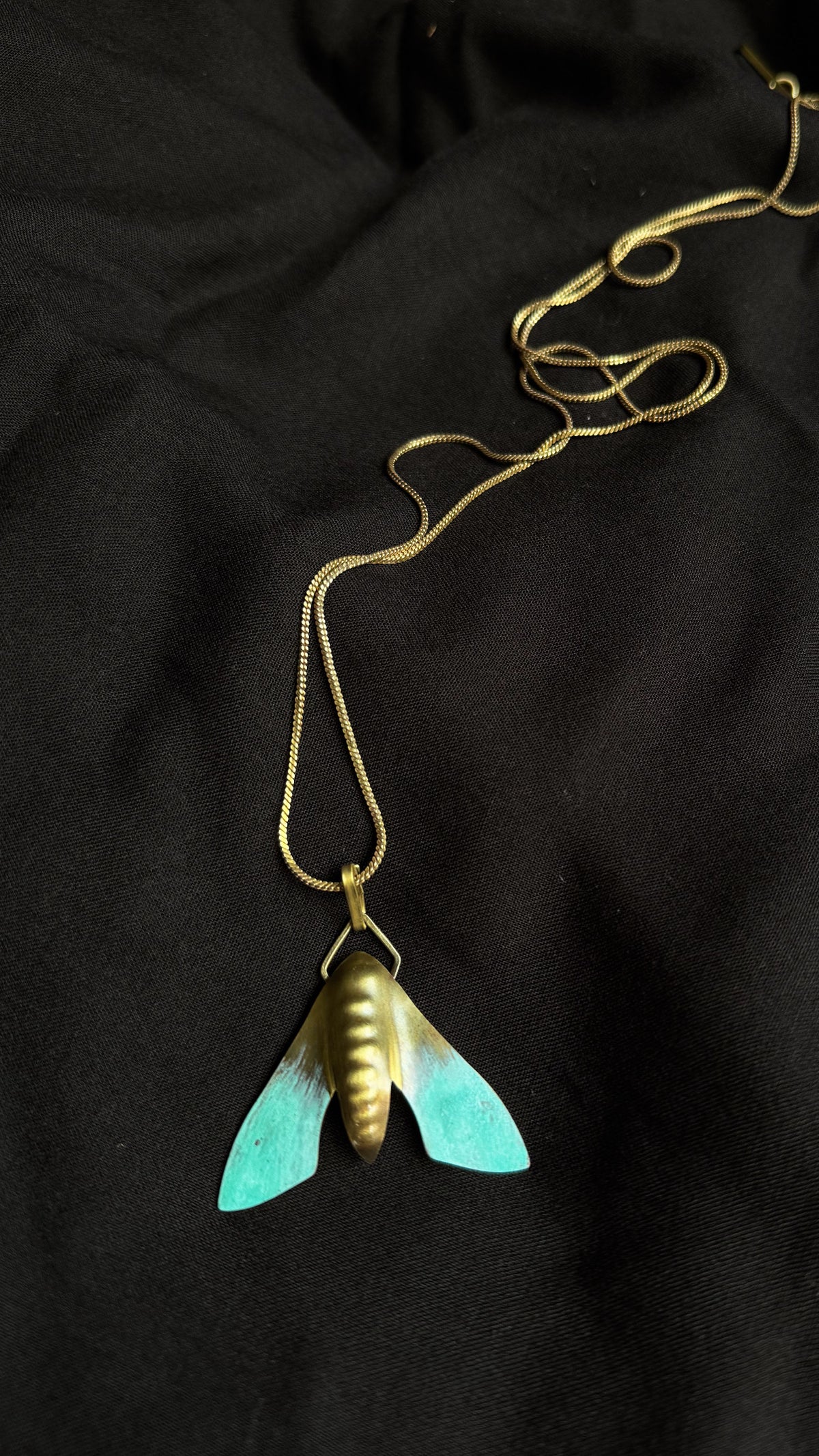 Hawkmoth Pendant Teal by Dookdi — handcrafted sculptural teal hawkmoth pendant, artisan nature jewelry Mitti Lifestyle