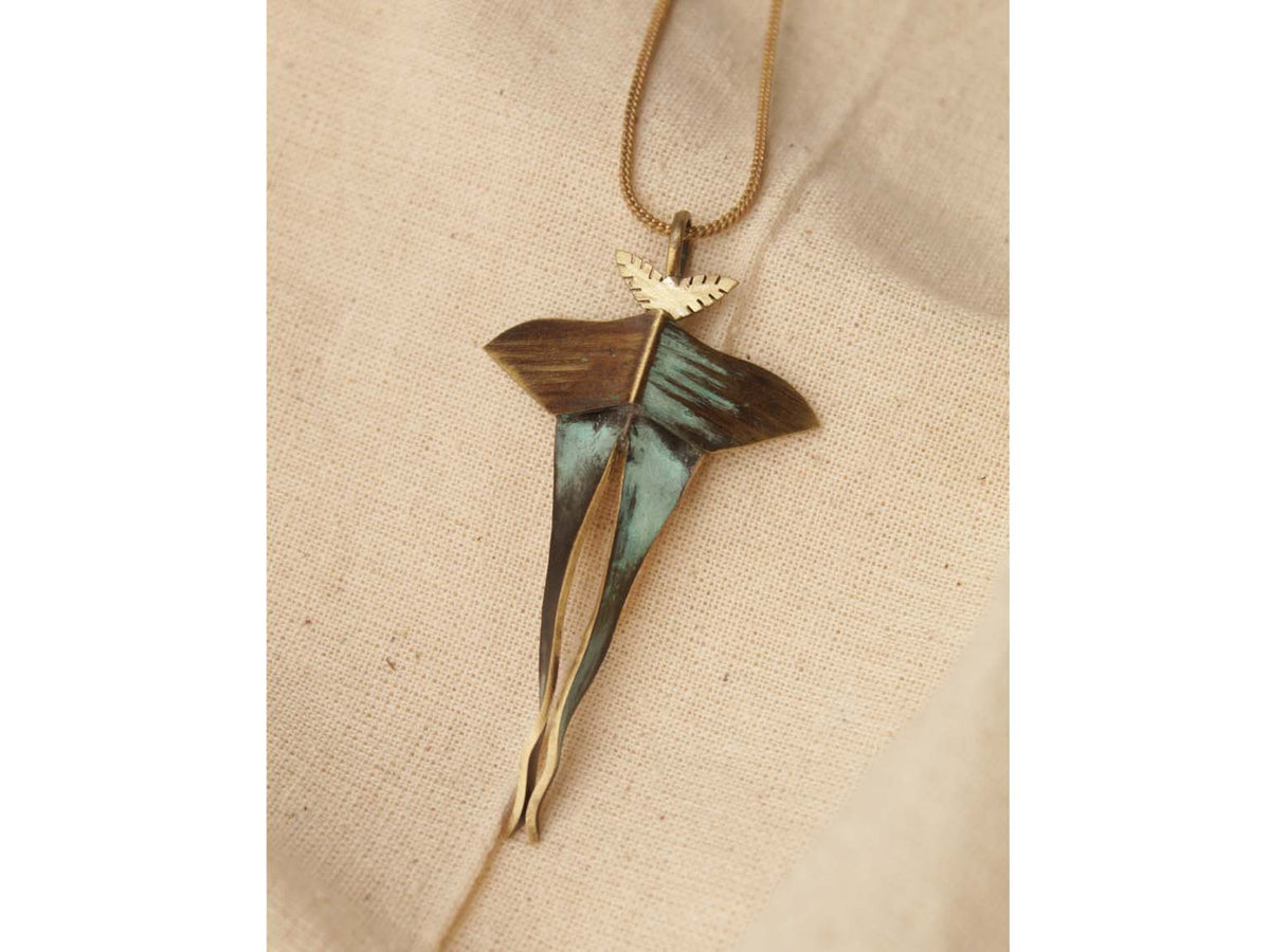 Chained Luna Moth Dookdi — close-up of luna moth pendant texture, handcrafted artisan sculptural nature jewelry
