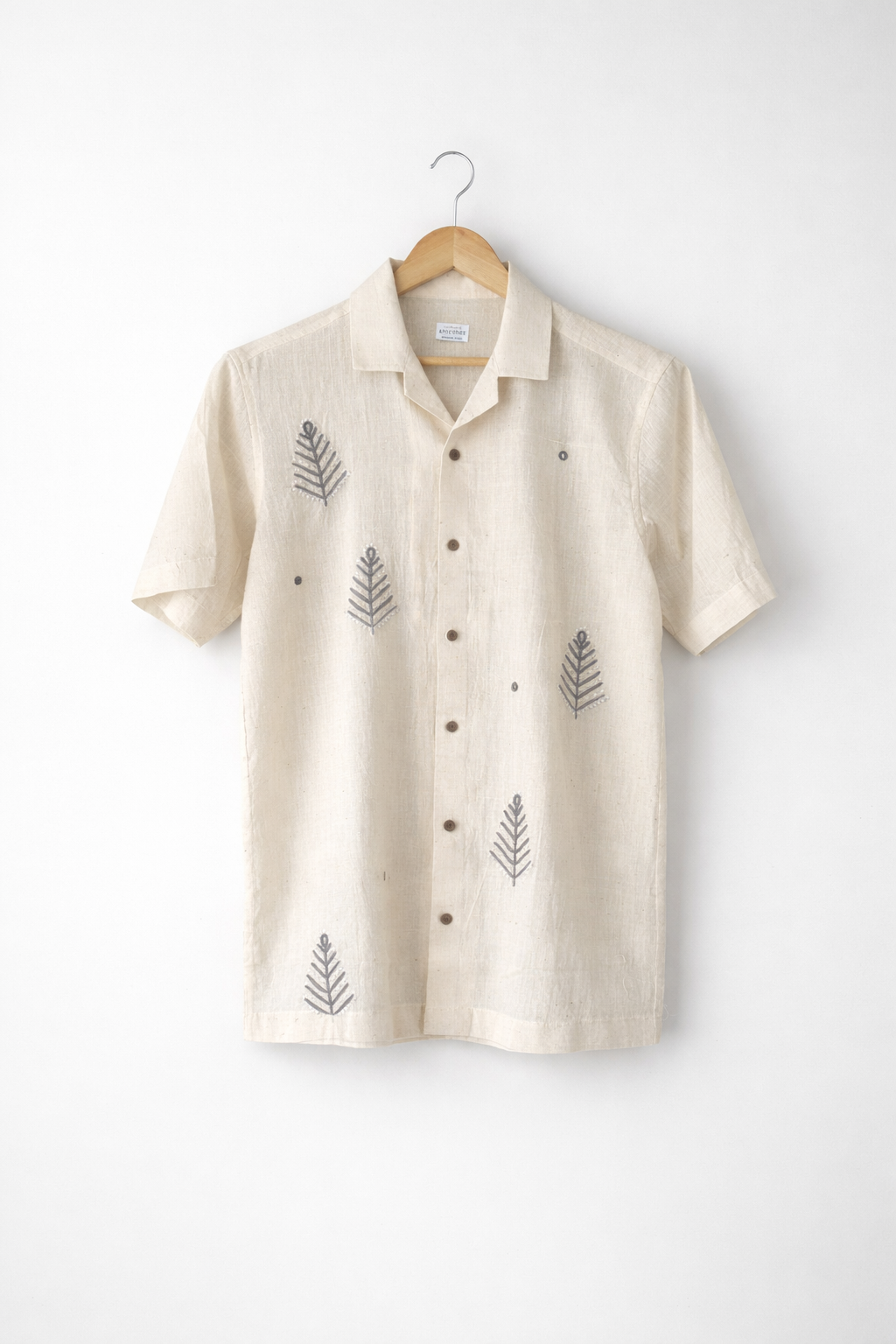 Beige shirt with leaf patterns 
