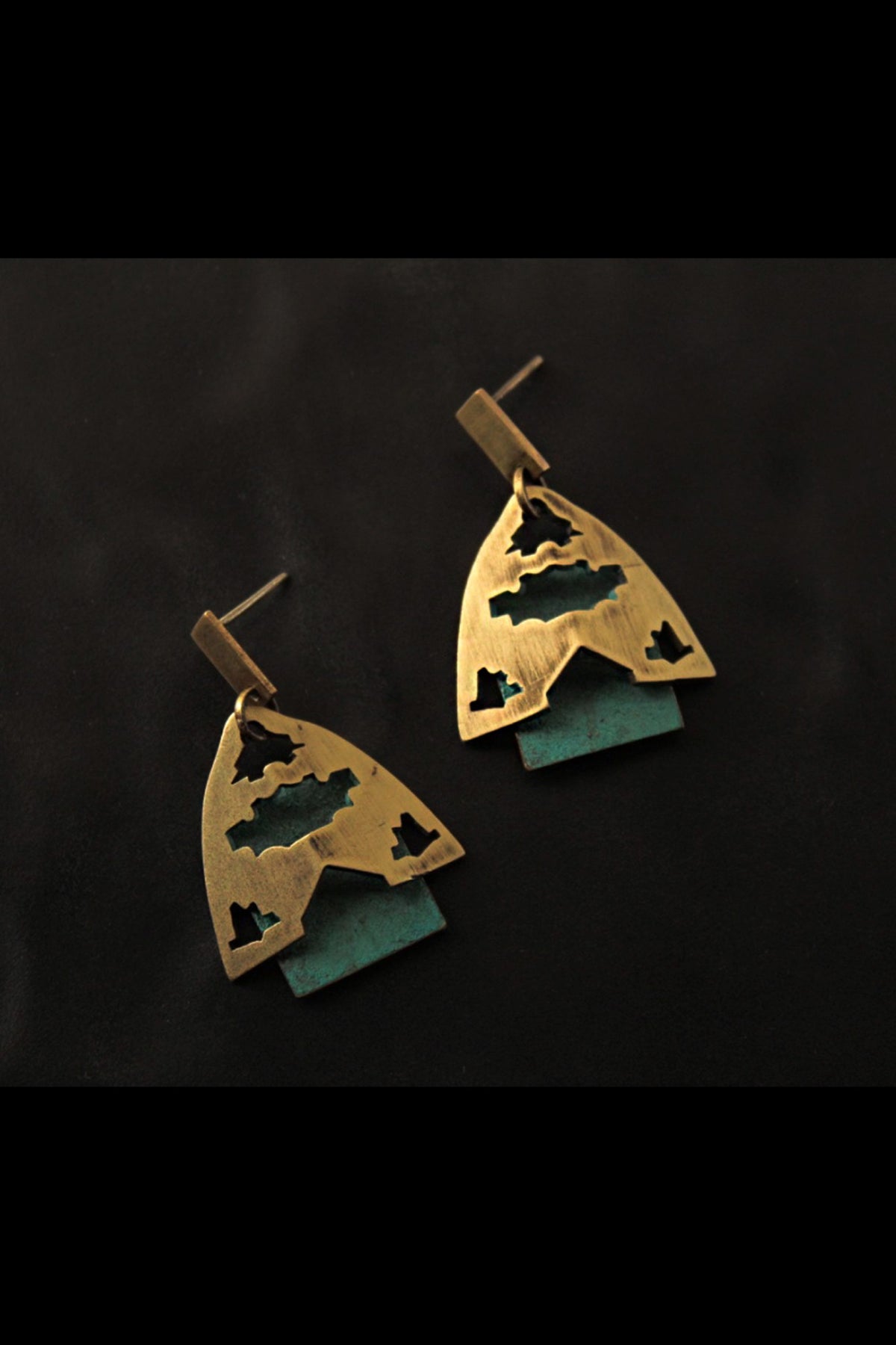 Else-wear earwear 5 Dookdi worn model brass sculptural India jewellery artisan