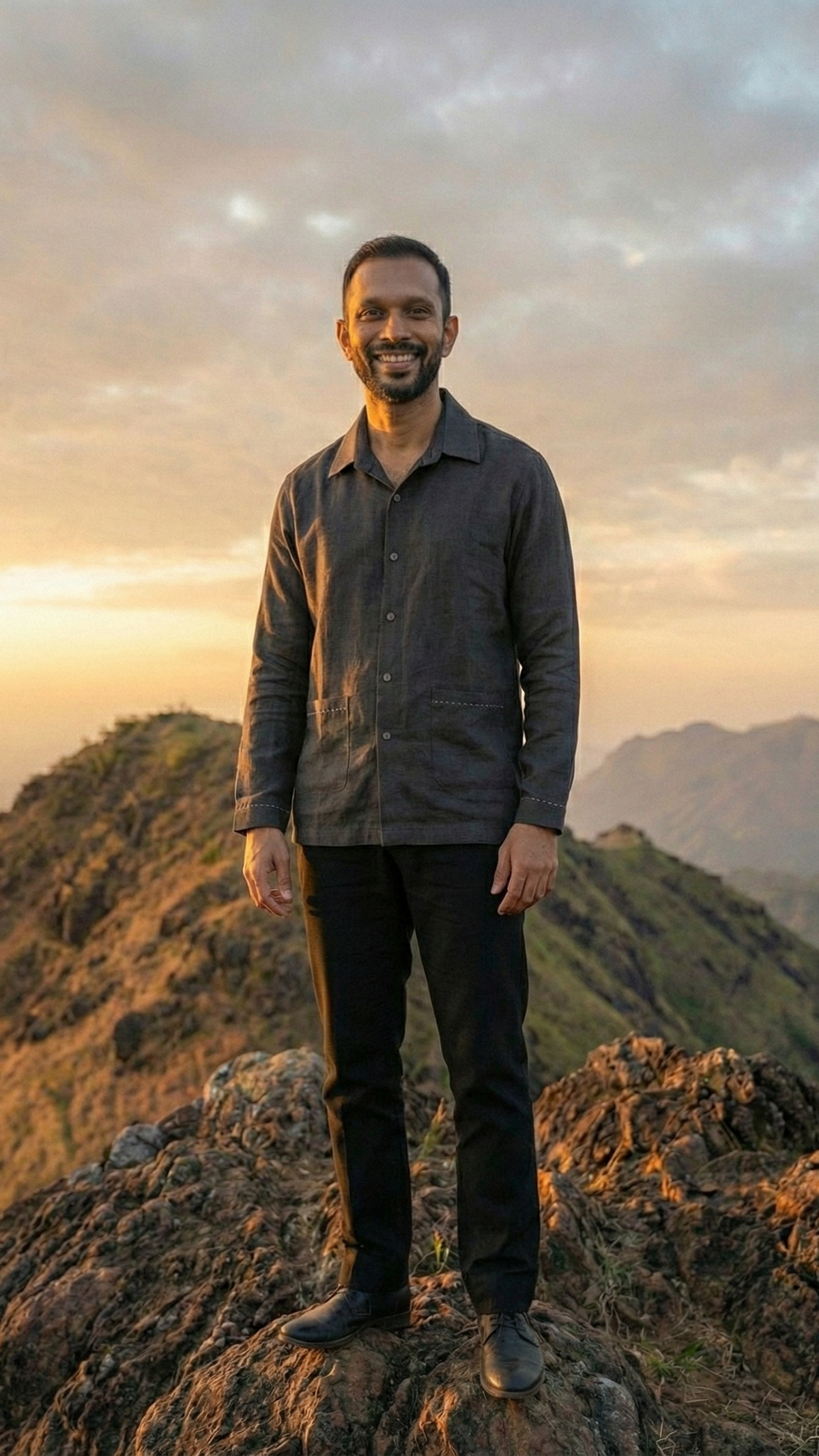 Handwoven kala cotton shirt designed with subtle embroidery, offering texture and everyday comfort.