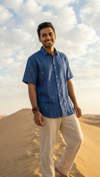 Men’s kala cotton shirt featuring breathable handspun fabric and a relaxed silhouette.