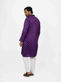 Man wearing a purple bandhej kurta 