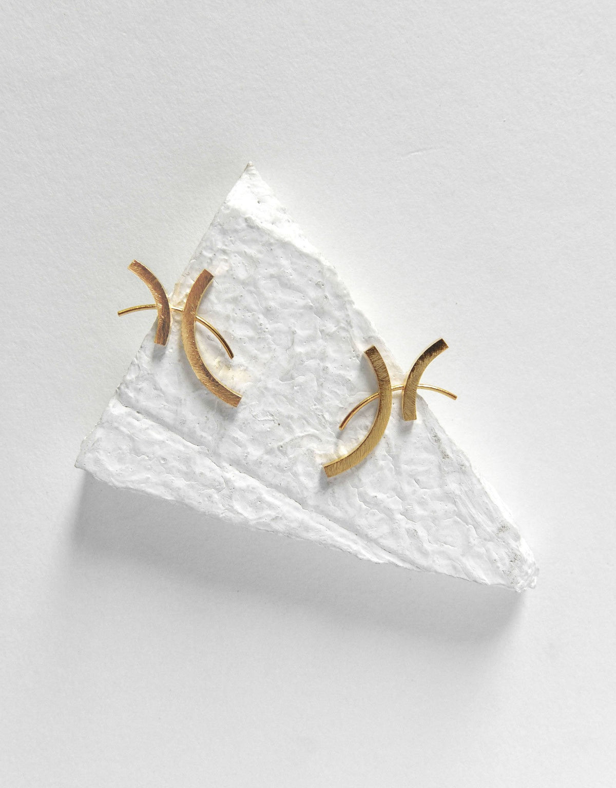 Eke studs worn model De'anma brass earrings handcrafted artisan India