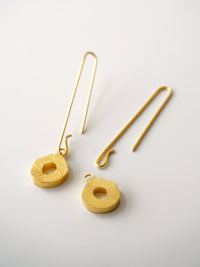 Alto Gorria worn model De'anma brass earrings handcrafted artisan India