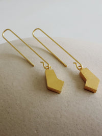 Alto Sakondu De'anma brass earrings worn model artisan jewellery handcrafted India