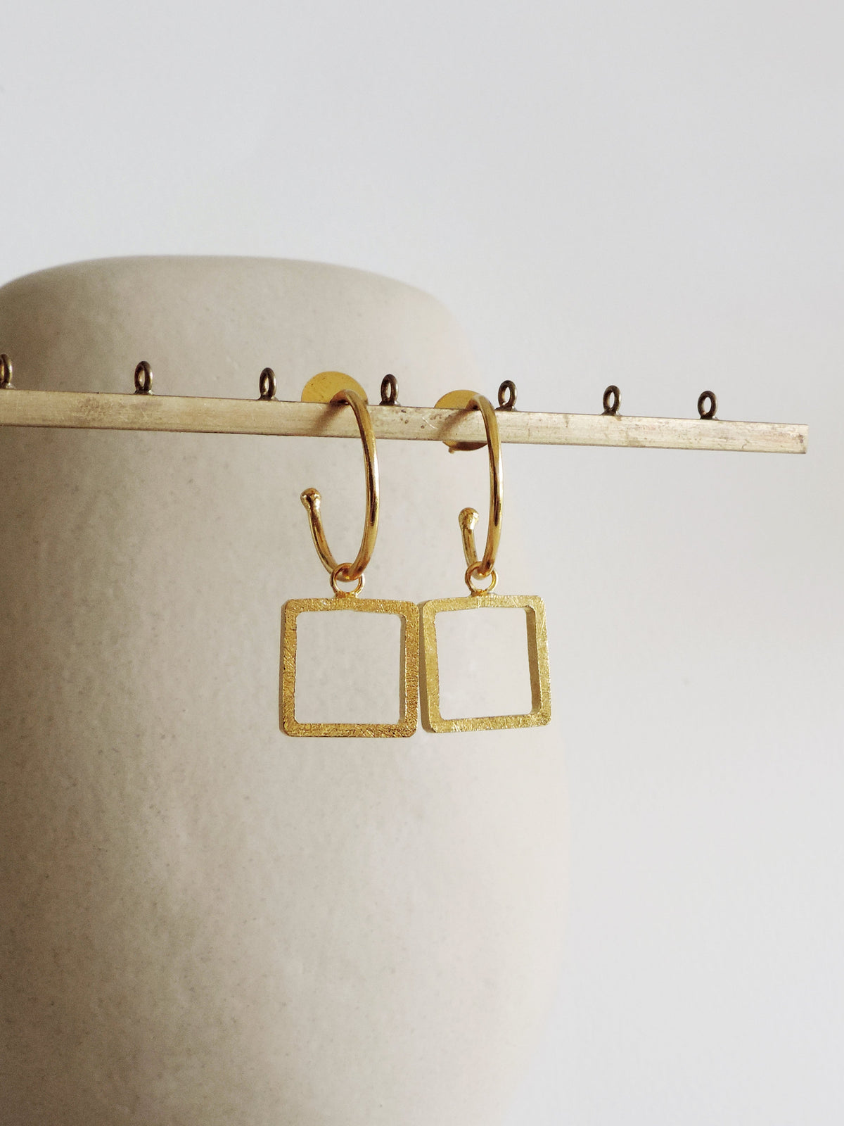 Oura Square XS geometric minimalism brass earrings De'anma handcrafted artisan India