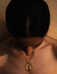 Eda charm De'anma handcrafted brass charm pendant artisan jewellery India
