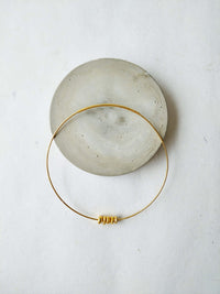 Thero De'anma brass jewellery close-up handcrafted artisan detail India