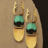 Stagbeetle teal earrings Dookdi worn model handcrafted brass jewellery India