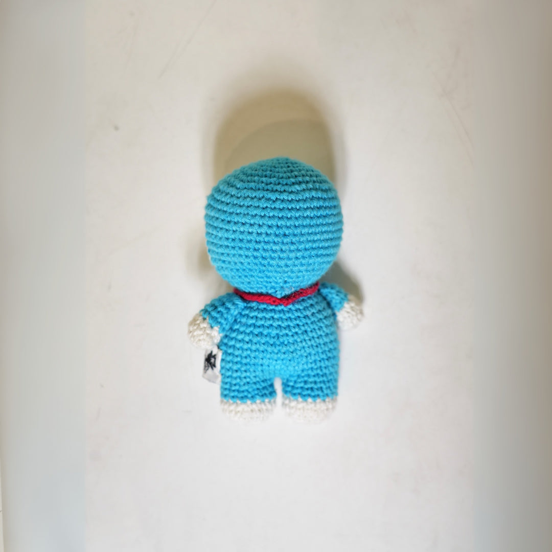 Doraemon Crochet Toy — side view showing crochet craft and natural fabric
