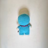 Doraemon Crochet Toy — side view showing crochet craft and natural fabric