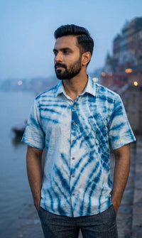 Handwoven kala cotton shirt designed with tie-dye detailing, offering unique patterns and everyday comfort.