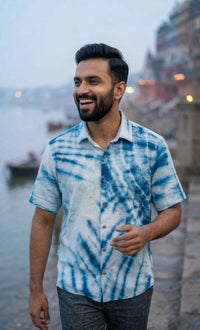 Handwoven kala cotton shirt designed with tie-dye detailing, offering unique patterns and everyday comfort.