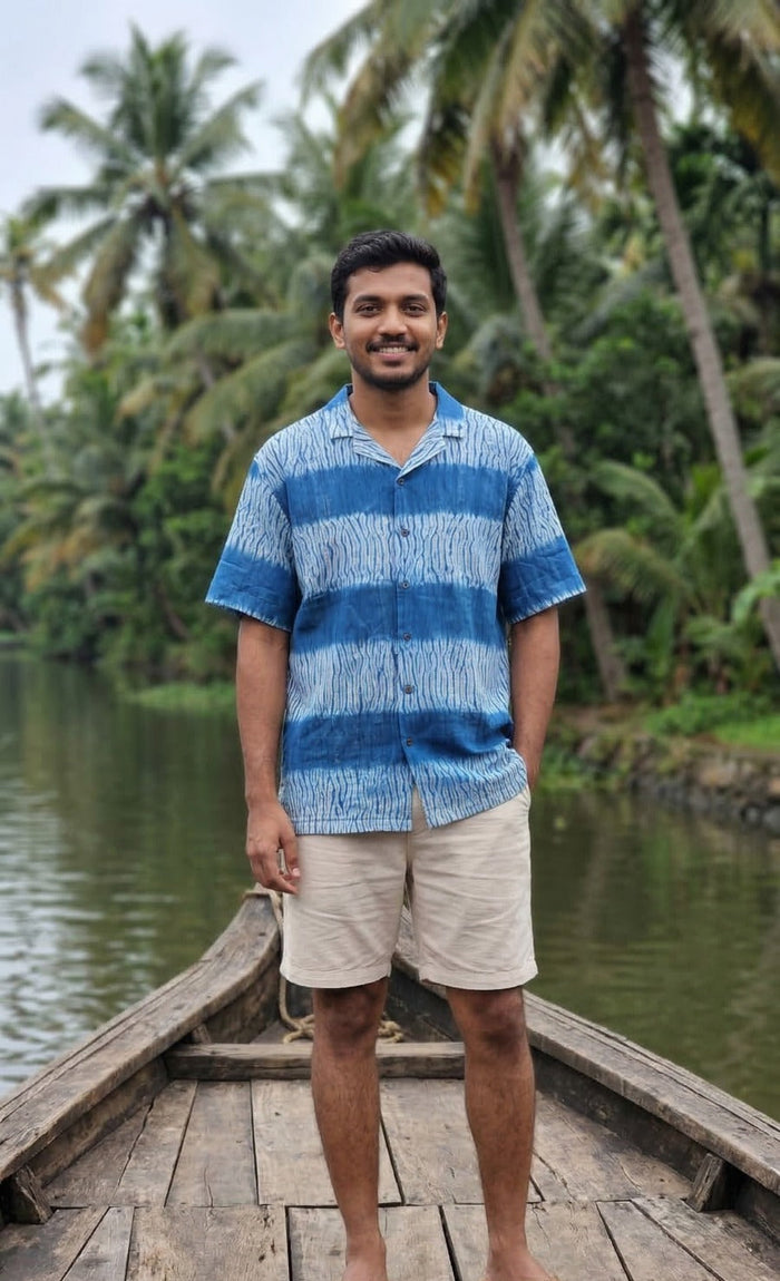Handwoven kala cotton shirt designed with Shibori dyeing, offering unique patterns and an airy, comfortable feel.