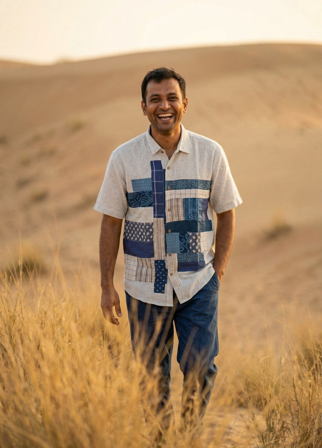 Handwoven kala cotton shirt designed with unique patchwork elements, offering texture and everyday comfort.