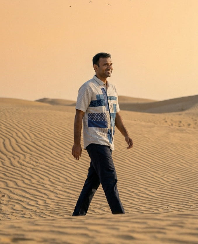 Handwoven kala cotton shirt designed with unique patchwork elements, offering texture and everyday comfort.