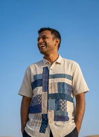 Handwoven kala cotton shirt designed with unique patchwork elements, offering texture and everyday comfort.