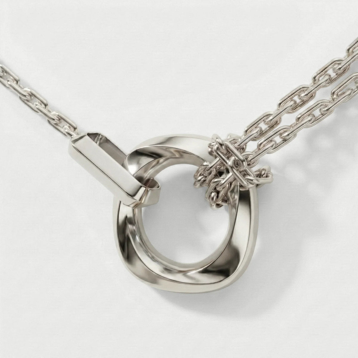 Squircle pendant with knotted chain close-up sterling silver Dori artisan India