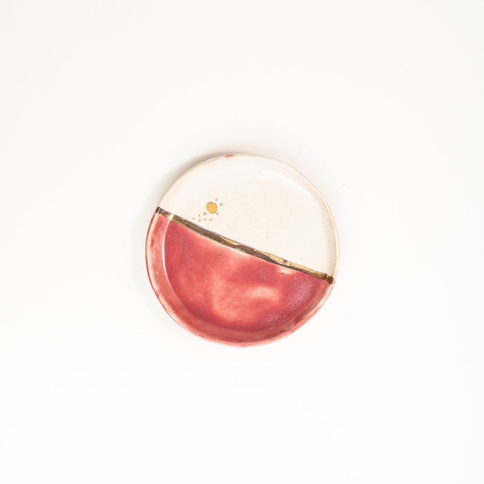 Golden seam small plate top view pink white artisan ceramic handcrafted India