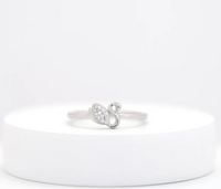 Graceful Swan Ring — close-up of handcrafted silver swan ring, artisan ethical jewelry Akaar